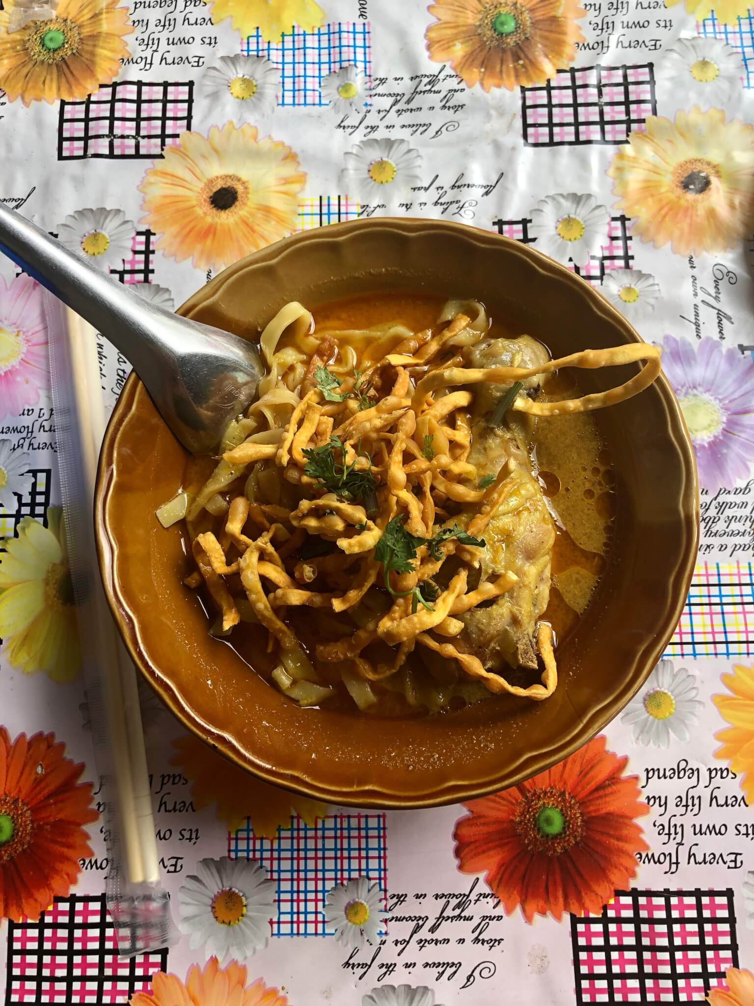 Khao Soi dish on flower table cloth