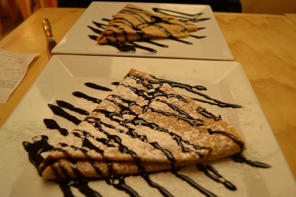 Two crepes in Amsterdam covered in chocolate sauce
