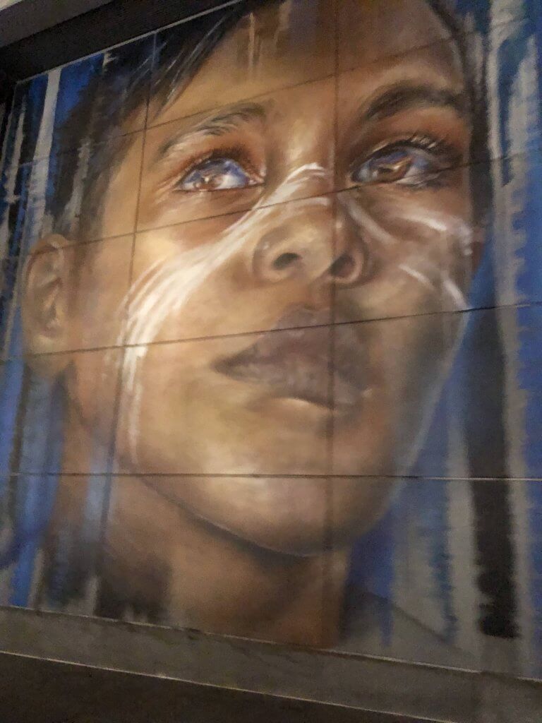 Artwork of Faces in Melbourne on Little Bourke Street