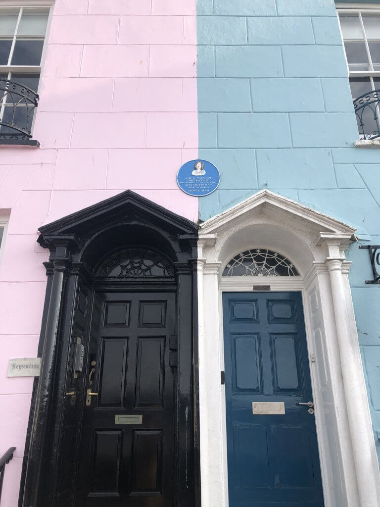 Symmetrical Doors in Tenby Pink and Blue walls in Pembrokeshire West Wales