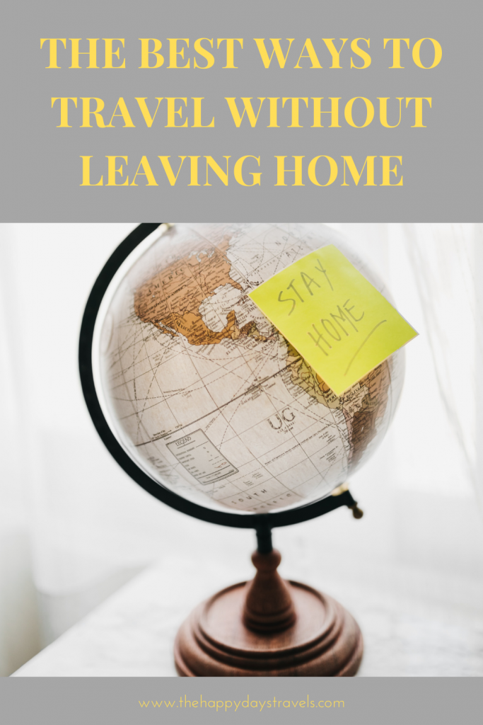 Pin image for the best ways to travel without leaving home. Globe with post it note saying stay home.