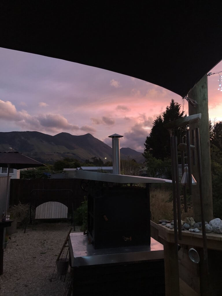 New Zealand Sunset pink with Takaka Hill in Back