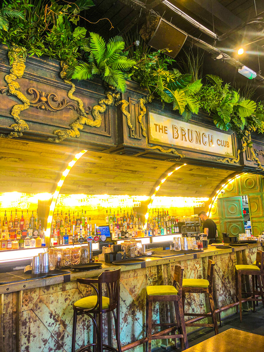 The Brunch Club Liverpool interior of the yellow, vintage bar