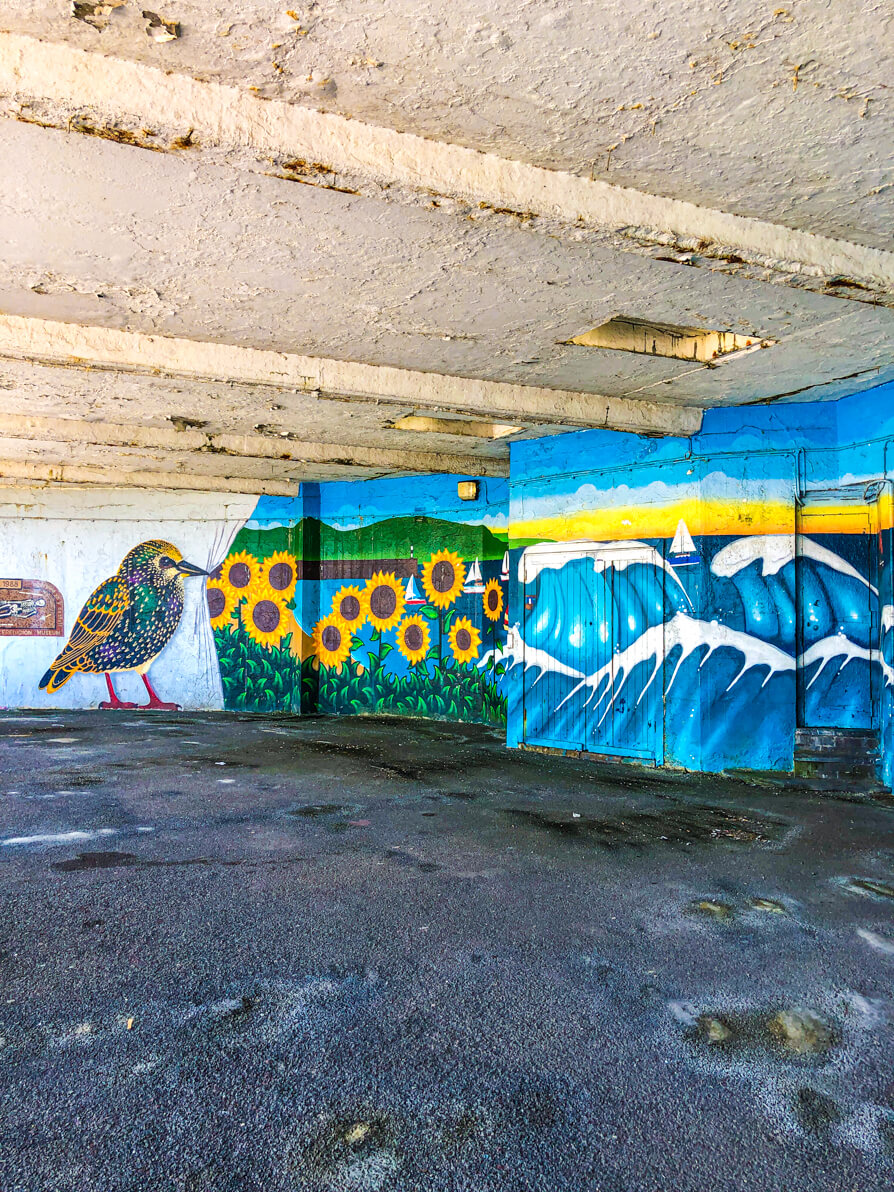 Street art in a tunnel at Aberystwyth South Beach