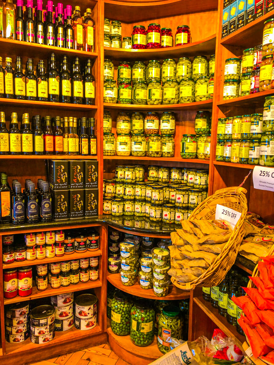 Olive and dried food shelves in Ultracomida in Narberth Pembrokeshire Wales