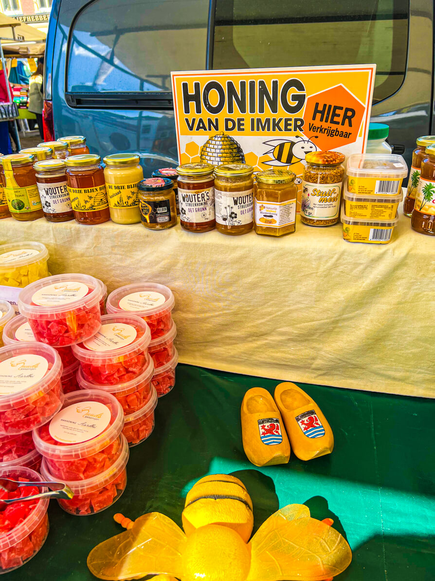 Honey jars being sold at the Market in Delft square, Netherlands