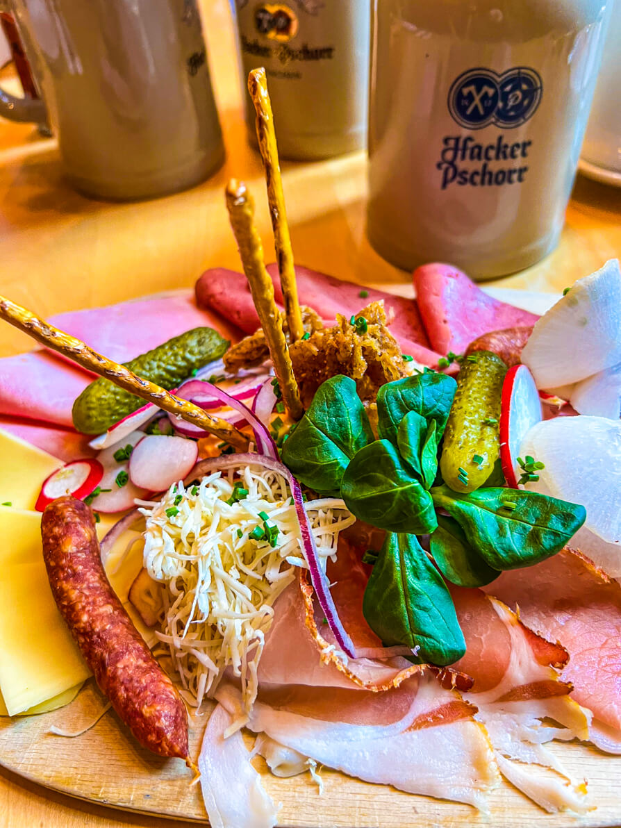 Close up image of meat cheese and dip platter in Munich Food Tour