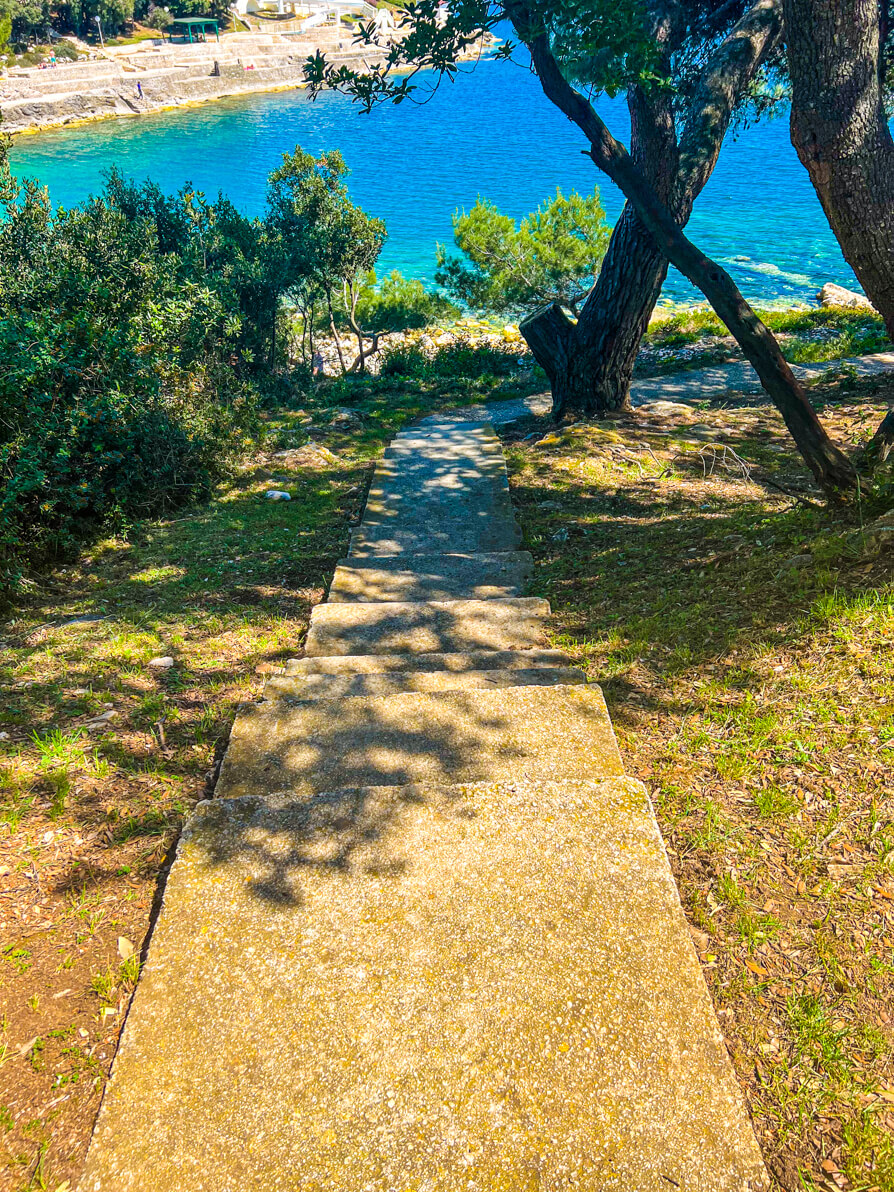 Steps leading down to Histria Beach in Verudela Pula Croatia