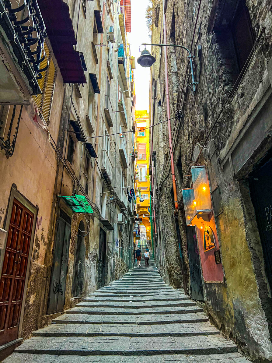 Image of narrow and steep steps leading up to the drinks quarter in Naples Italy