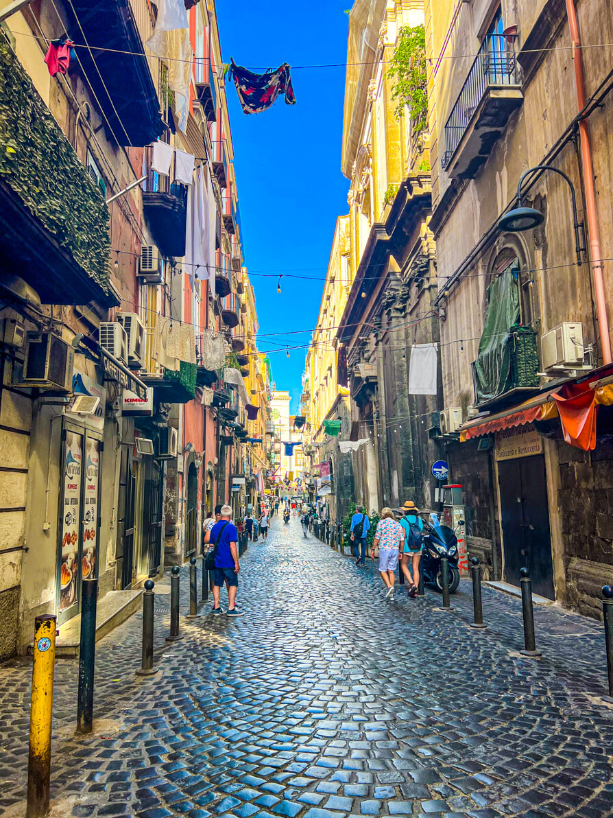 Image of Naples street with cobbled path in Naples Italy