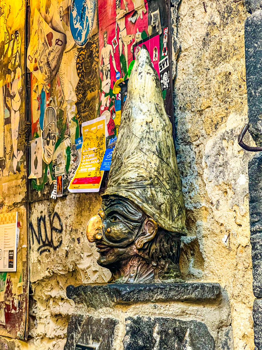 Image of the nose to rub for good luck in Via Tribulani in Naples Italy