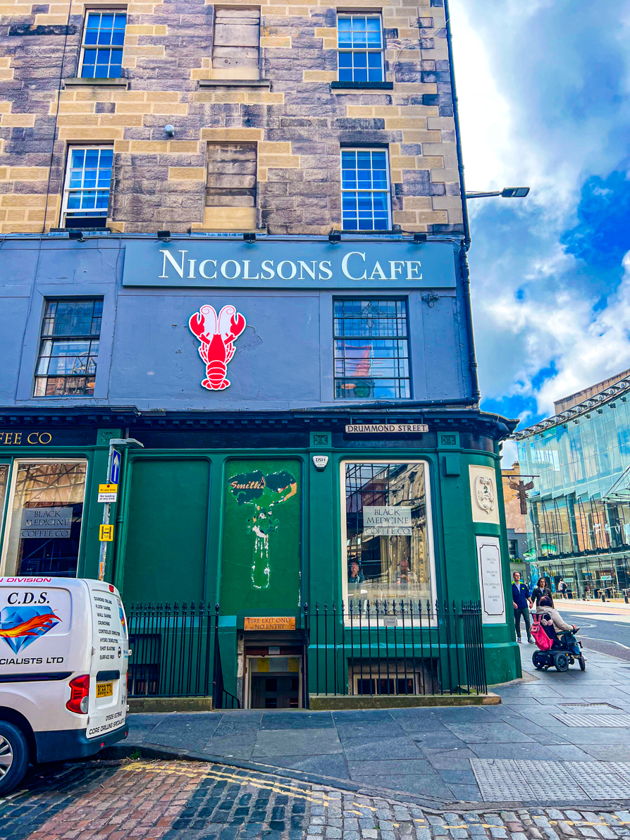 Exterior shot of the side sign of Nicolsons Cafe in Edinburgh