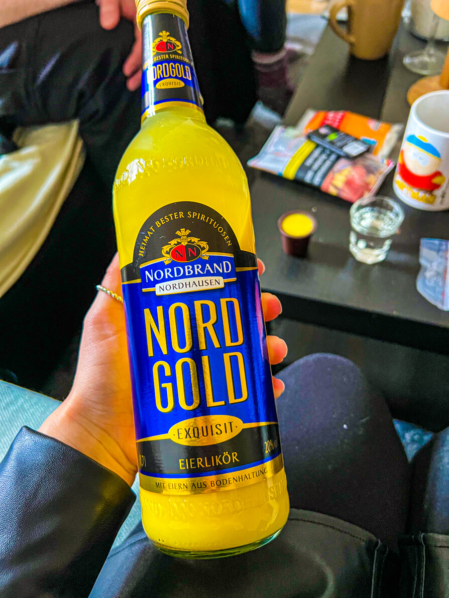 Image of Shireen holding the Nord Gold bottle in her left hand in Germany