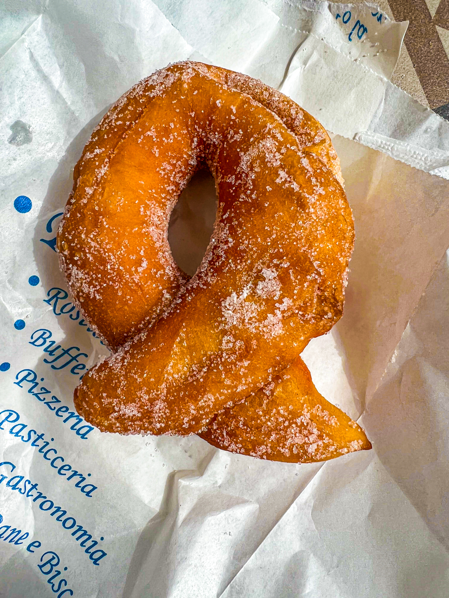 Image of doughnut pastry with sugar in Italy
