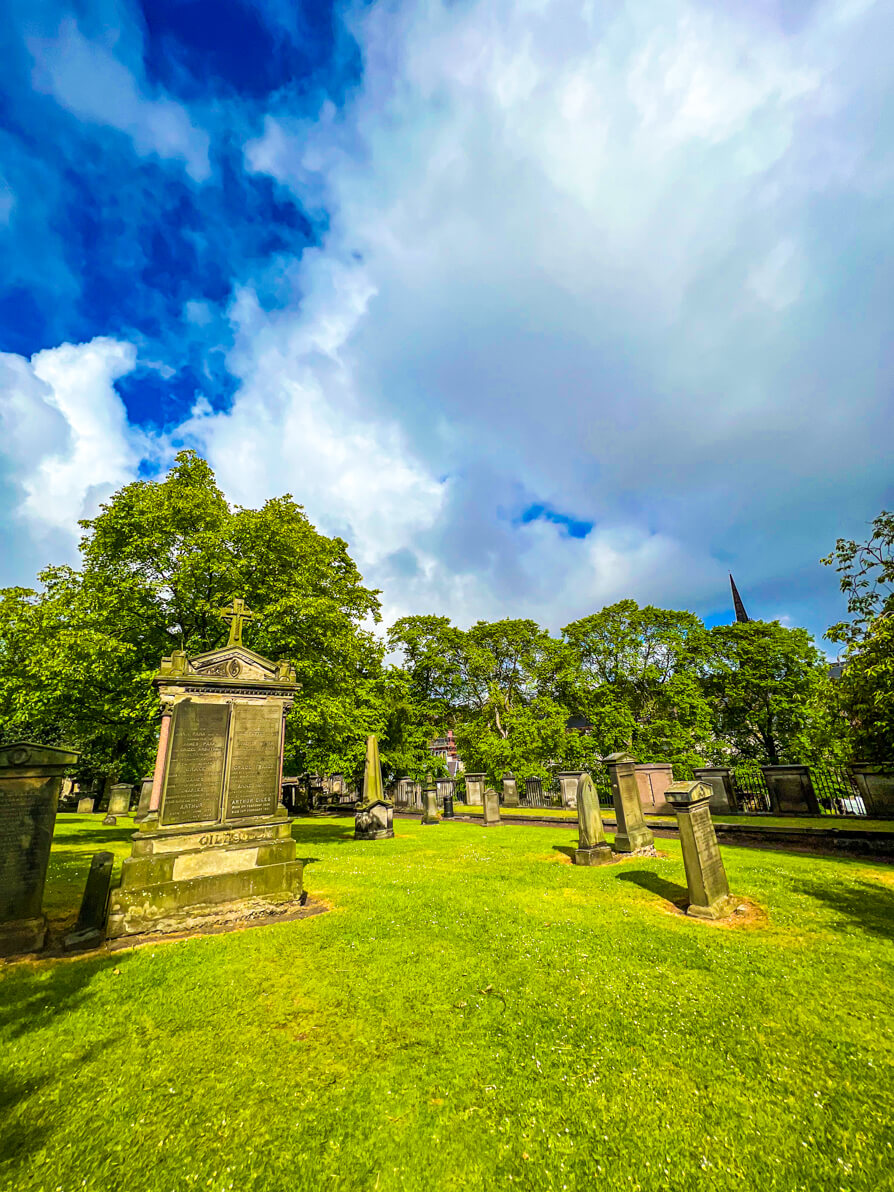 Wide shot image of Anne and Robert Potter grave in Greyfriars Kirkyard Harry Potter Graveyard in Edinburgh Scotland