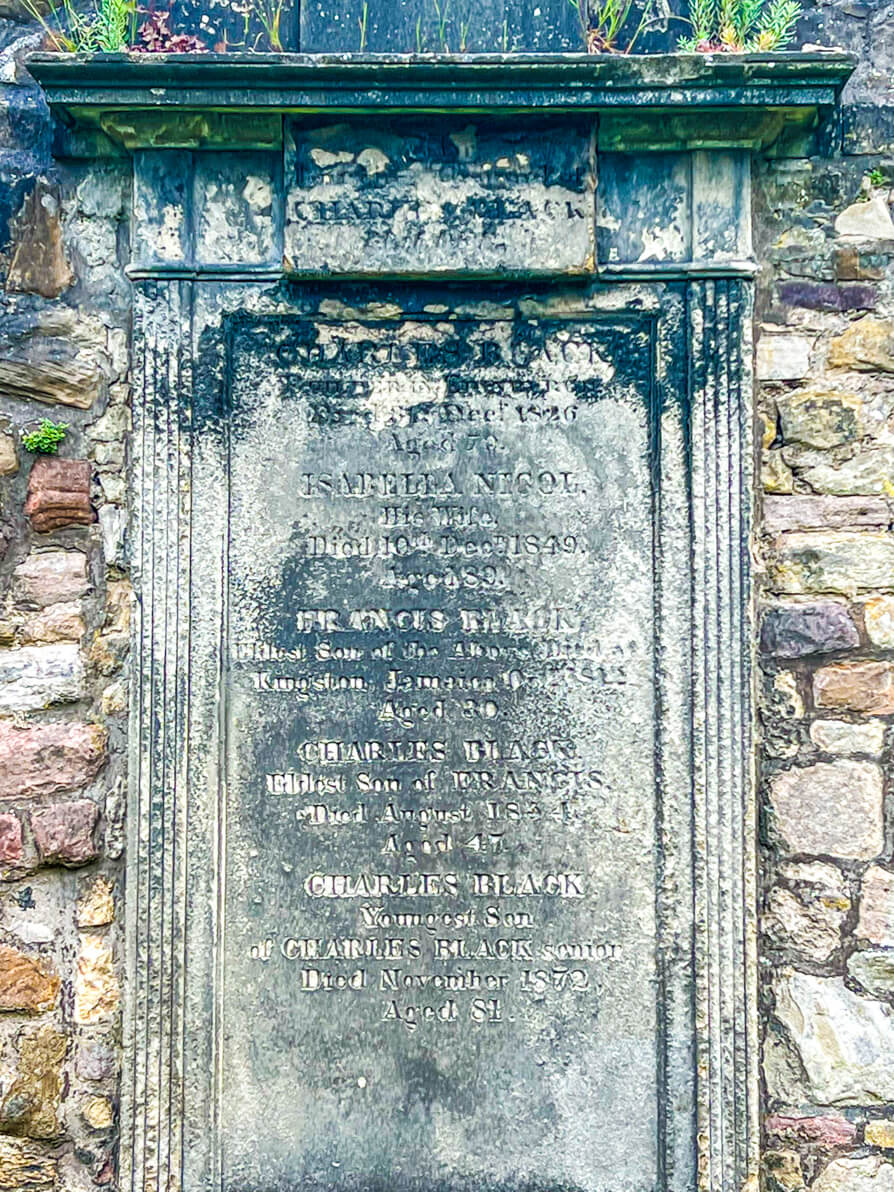 Close image of Black grave in Greyfriars Kirkyard Harry Potter Graveyard in Edinburgh Scotland