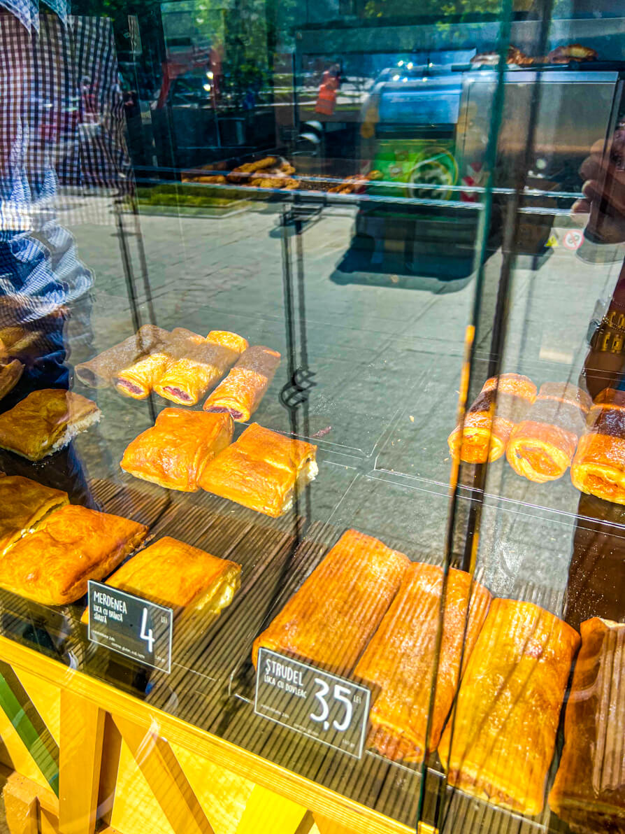 Image of pastries in a shop window in Romania