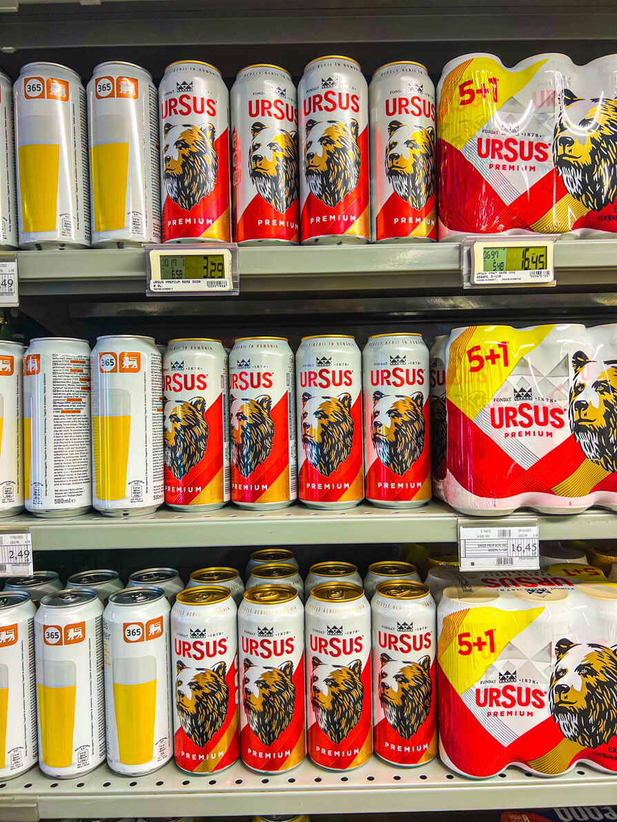 Image of Ursus beers on shelf in supermarket in Romania