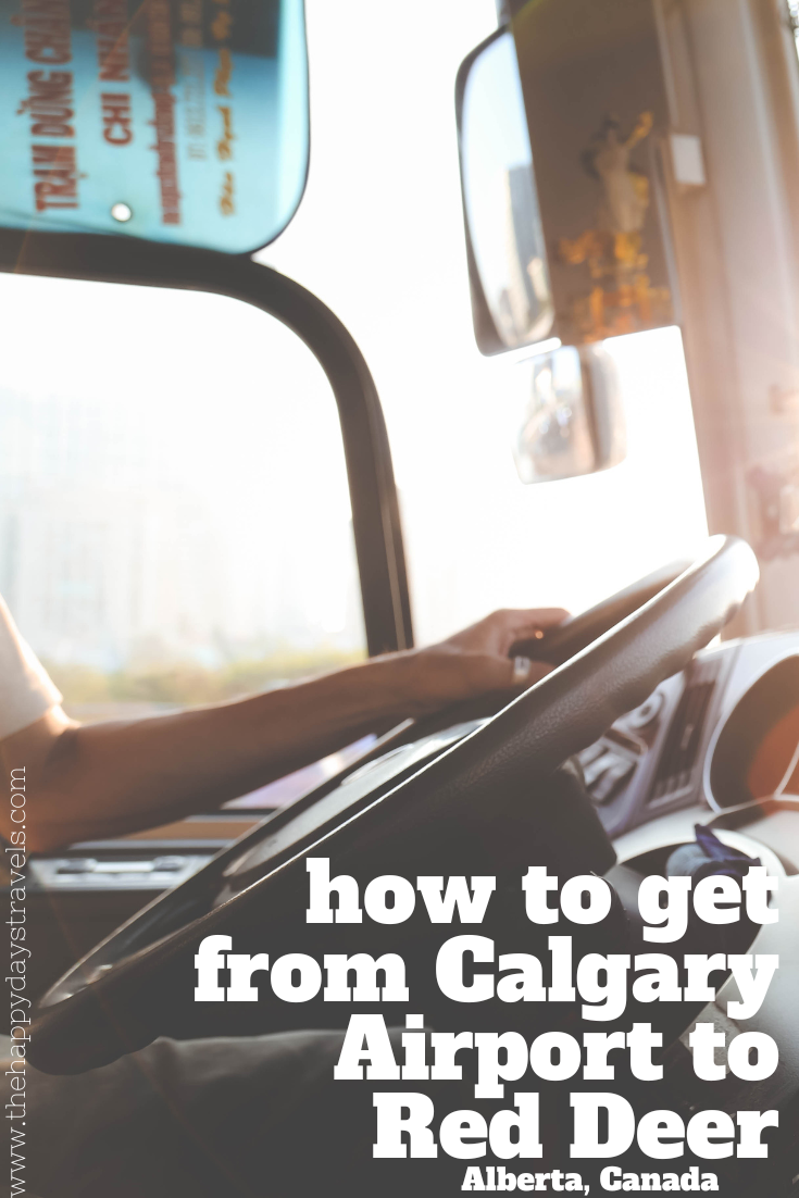 pin image text reads 'how to get from Calgary Airport to Red Deer Alberta Canada' with image of interior of bus steering wheel.