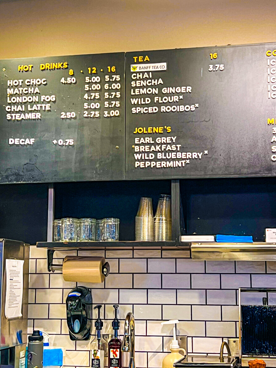 Image of Wild Flour Bakery coffee board with Jolene's Tea listed in Banff