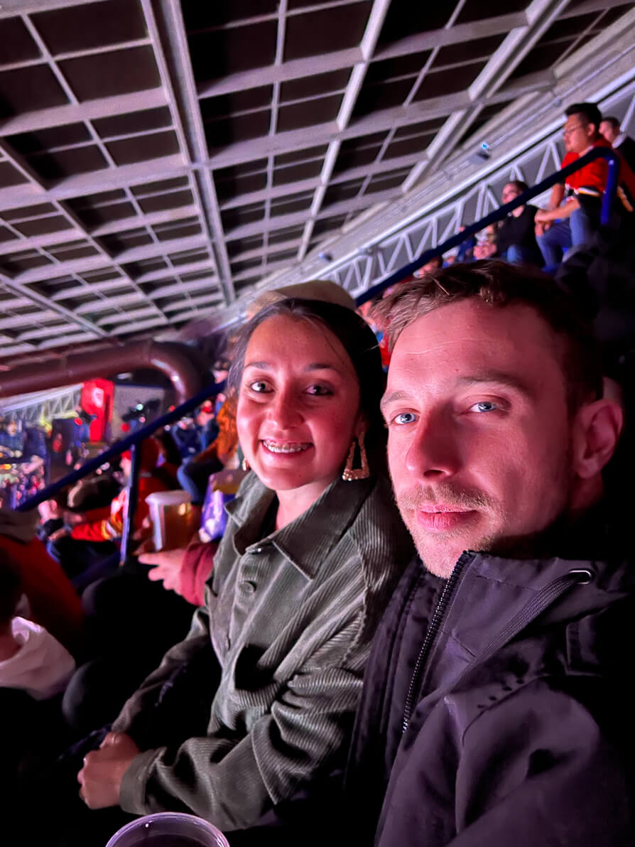 Shireen in Saddleback Stadium watching ice hockey match in Calgary