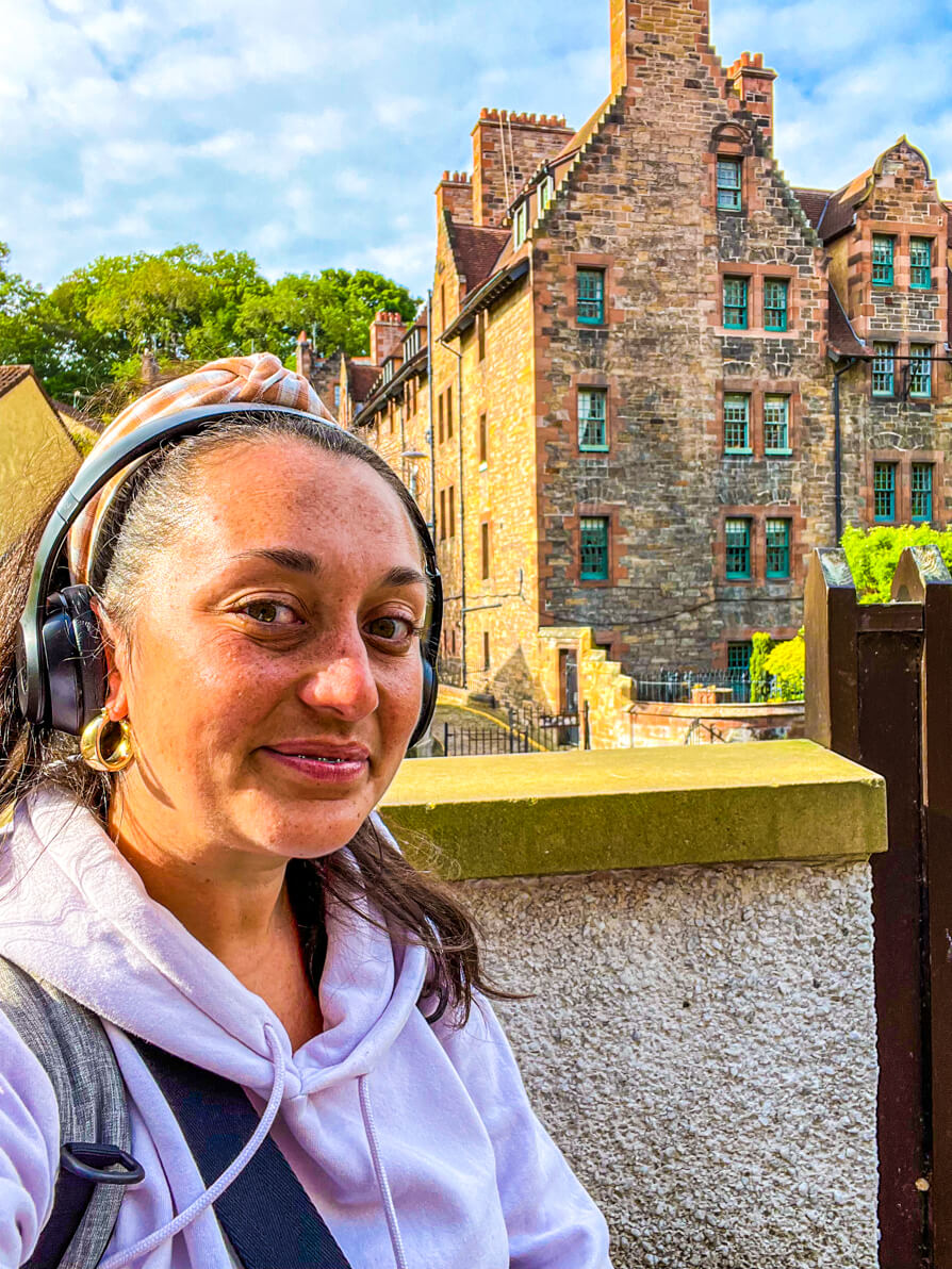 image of Shireen in front of Wells Court in Dean Village Edinburgh