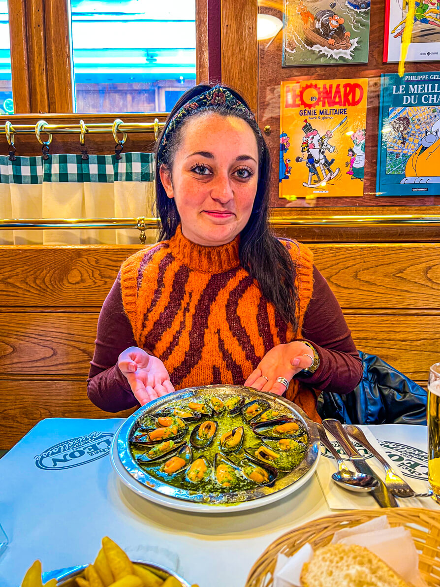 Shireen proudly presenting mussels in Brussels from Chez Leon
