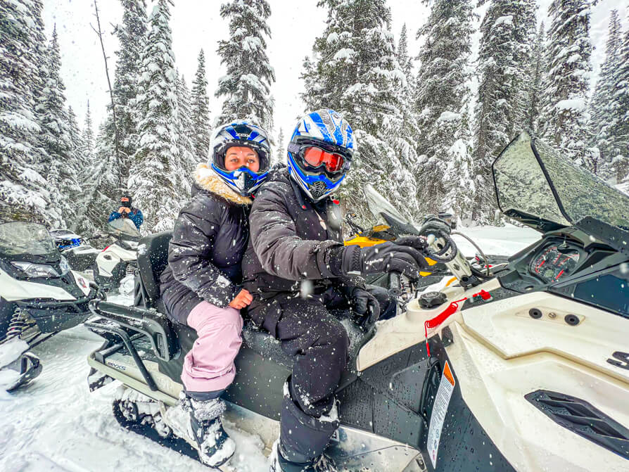 Image of Shireen and partner on a snowmobile in BC Canada