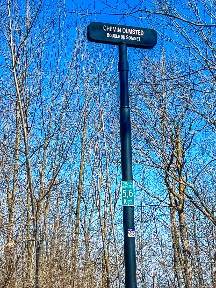 Sign of Olmsted Trail on Hiking Mount Royal in Montreal Canada