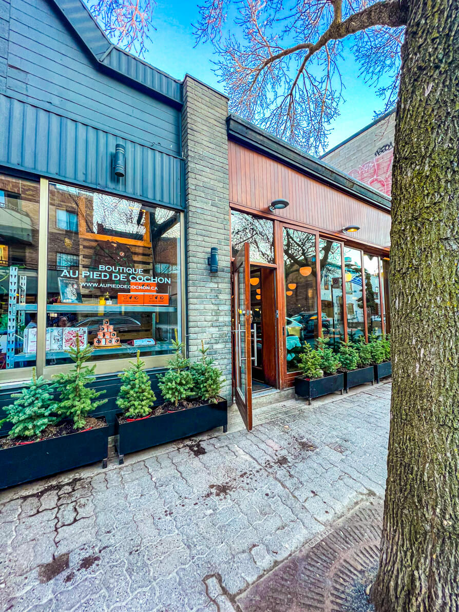 Exterior of  Au Pied de Cochon, Somebody Feed Phil filming location is found in Montreal Canada