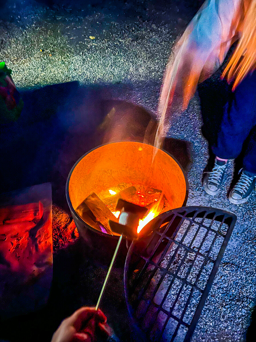 image of s'mores over a firepit in Sundance Lodge Trappers Tent