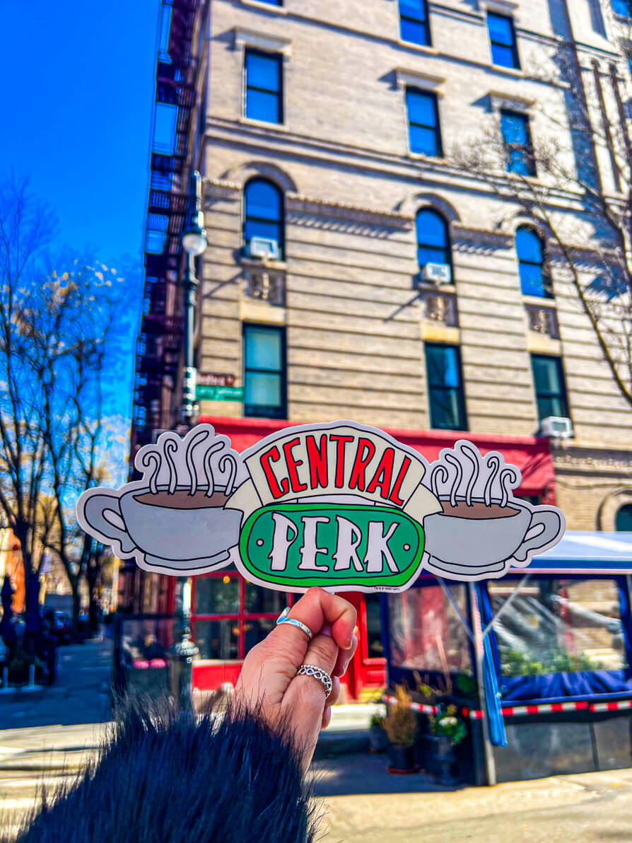 image of Central Perk sign outside of the friends apartment in NYC